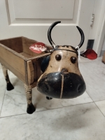 Steenmal met koe van oud blik