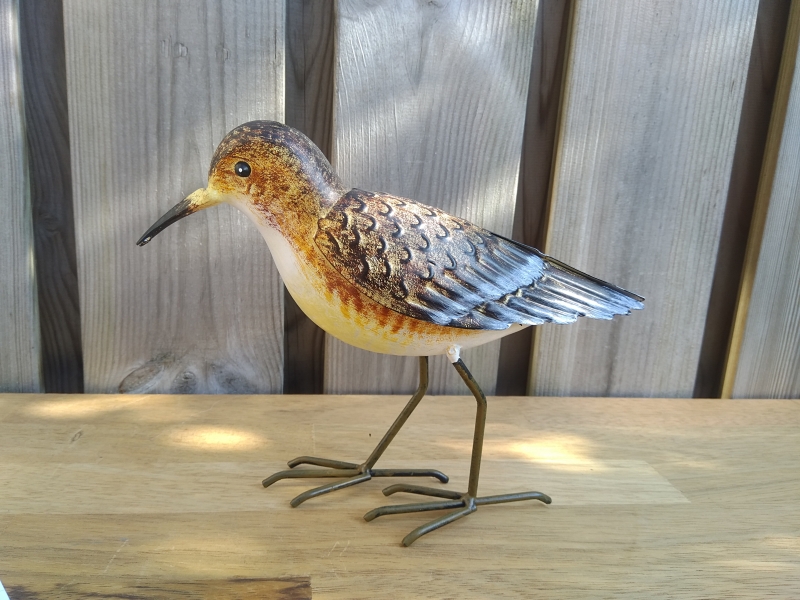 Metalen beeldje strandloper