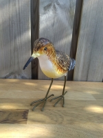 Metalen beeldje strandloper